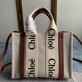 SMALL STRAP WOODY TOTE BAG 26.5 IN BEIGE LINEN CANVAS BLACK WEBBING LOGO EMBROIDER BROWN CALFSKIN