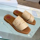 WOODY MULE IN TUSCAN BEIGE LAMBSKIN WITH EMBROIDERED LOGO