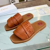 WOODY MULE IN BRONZE BROWM LAMBSKIN WITH EMBROIDERED LOGO