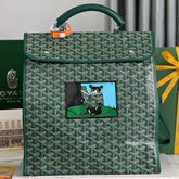 SAINT LÉGER BACKPACK 35 IN GREEN GOYARDINE CANVAS AND CALFSKIN WITH CARTOON PATCH