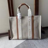 LAGRE WOODY TOTE BAG 45 IN BEIGE LINEN CANVAS WEBBING LOGO EMBROIDERY BROWN CALFSKIN
