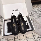 SLINGBACK LOAFER IN BLACK CALFSKIN AND SHEARLING