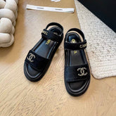 CC SANDALS IN BLACK FUR GOLD HARDWARE