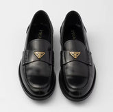 PRADA LOAFER IN BLACK PATENT CALFSKIN