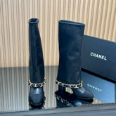 CHANEL 25S KNEE-HIGH HEELED BOOTS 65MM IN BLACK CALFSKIN GOLD HARDWARE