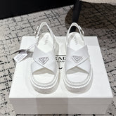 PRADA 25S CRISSCROSS SANDALS IN WHITE CALFSKIN LOGO