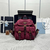 PRADA 25S RE-EDITION 1978 SMALL BACKPACK 28 IN BURGUNDY RE-NYLON