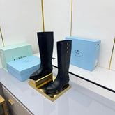 PRADA 25S CHUNKY SOLE TALL BOOTS MARTIN 50MM IN BLACK CALFSKIN