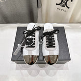 PRADA 25S MULES IN WHITE WITH METAL TOECAP