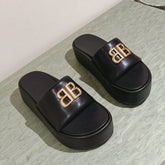 RISE SANDALS IN BLACK SHINY LAMBSKIN GOLD BUCKLE