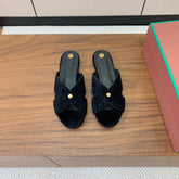 FLAT SLIPPERS IN BLACK SUEDE