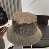 MM BUCKET IN MUTED BROWN VELVET WITH LOGO