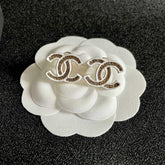 DOUBLE C STUD EARRINGS WITH WHITE TRIM AND CENTER STONE