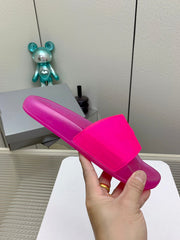 POOL SLIDE SANDAL IN JELLY PINK RUBBER