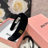 HEADBAND IN BLACK PLUSH FABRIC 423599