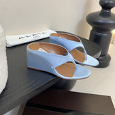 ALAIA WEDGE THONG SANDALS 25S IN BLUE SATIN