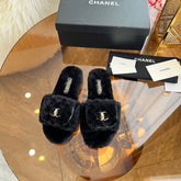 CHANEL 25S FUR SLIPPERS IN BLACK LOGO GOLD HARDWARE