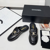 CHANEL 25S MULES WITH CHAIN DETAIL IN BLACK GLOSSY CALFSKIN GOLD HARDWARE