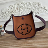 MINI NEO 17 EVELYNE BAG IN BRONZE BROWN CANVAS AND PLUM PURPLE CALFSKIN