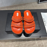 ALAIA DOUBLE-STRAP SANDALS 25S IN ORANGE CALFSKIN