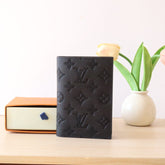 LV 25S PASSPORT HOLDER 14 IN BLACK EMBOSSED MONOGRAM SHADOW CALFSKIN