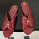 FLAT SLIPPERS IN RED CALFSKIN SNAKE EMBOSSING