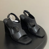 HM 25S KALYA WEDGE SANDAL 100 MM IN BLACK LAMBSKIN