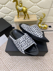 BALMAIN 25S BALMAIN MULES IN BLACK AND WHITE CALFSKIN
