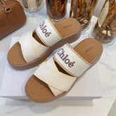WOODY WEDGE SANDALS IN WHITE CANVAS WITH CIDER BROWN RUBBER SOLE