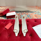 VIV CANARD ANKLE BOOTS IN WHITE GLOSSY CALFSKIN