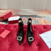 VIV CANARD ANKLE BOOTS IN BLACK PATENT CALFSKIN