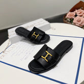 MARCIE SLIDE IN BLACK CALFSKIN WITH GOLD HARDWARE