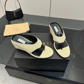 ALAIA WEDGE THONG SANDALS 25S IN LIGHT BEIGE RAFFIA