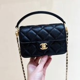CHANEL FLAP BAG 16 IN BLACK GRAINED CALFSKIN GOLD HARDWARE