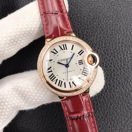 BALLON BLEU 33MM ROSE GOLD CASE DIAMOND BEZEL RED LEATHER