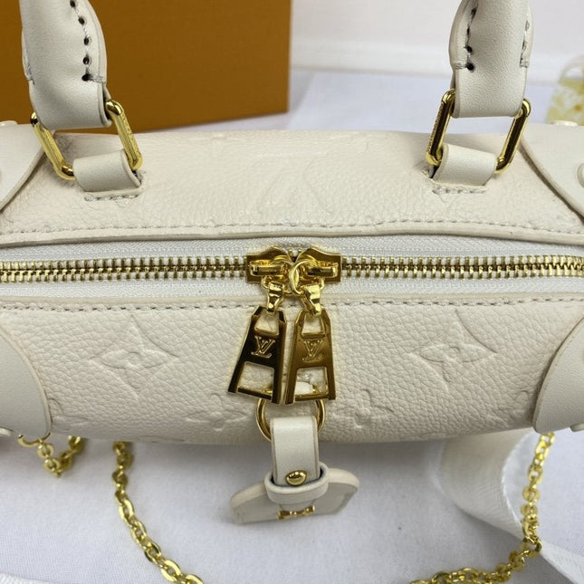 LV PETITE MALLE SOUPLE WHITE MONOGRAM EMPREINTE