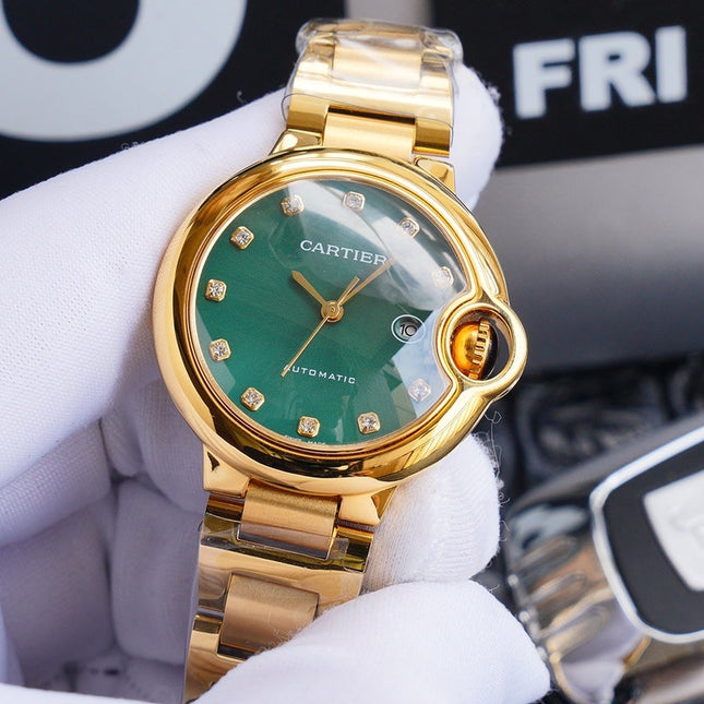 BALLON BLEU 33MM GOLD GREEN DIAL DIAMOND NUMERALS