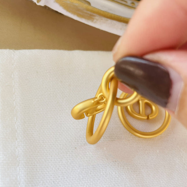 CD NAVY EARRINGS GOLD