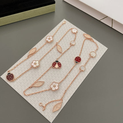 LUCKY SPRING 15 MOTIFS PINK GOLD NECKLACE