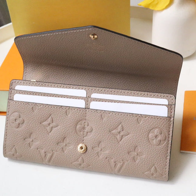 SARAH WALLET BEIGE MONOGRAM EMPREINTE 19CM