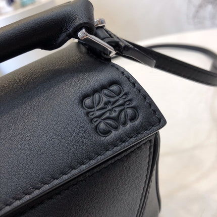 LOE MINI 18 PUZZLE BAG IN BLACK CALFSKIN