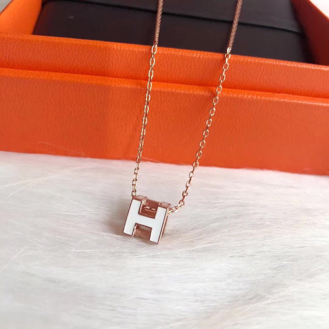 H WHITE SQUARE PINK GOLD NECKLACE