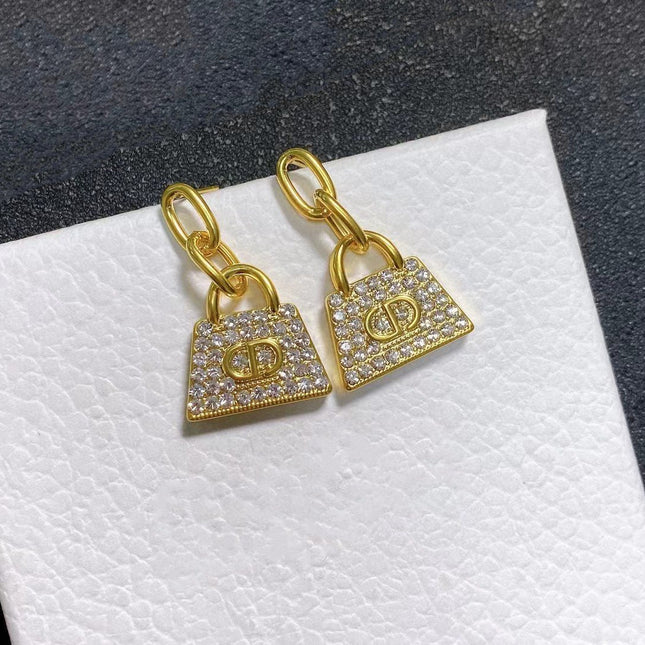 CD BAG GOLD DIAMOND EARRINGS