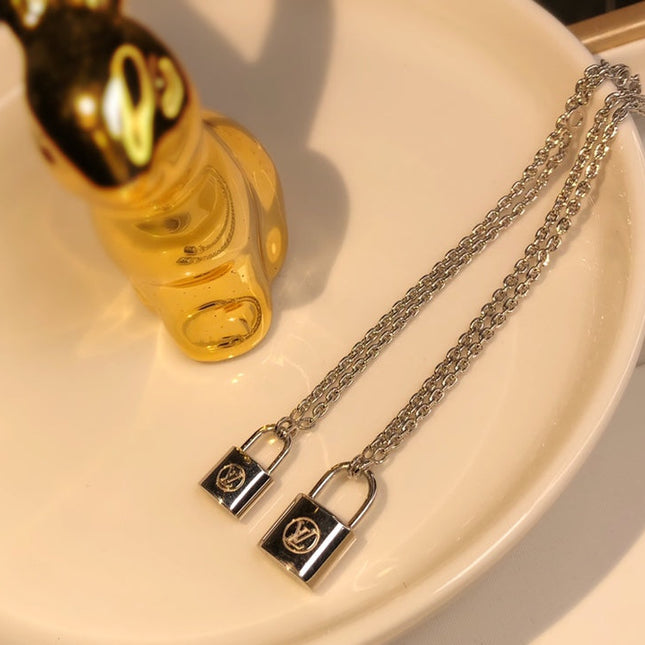 LV CHARITY LOCK NECKLACE