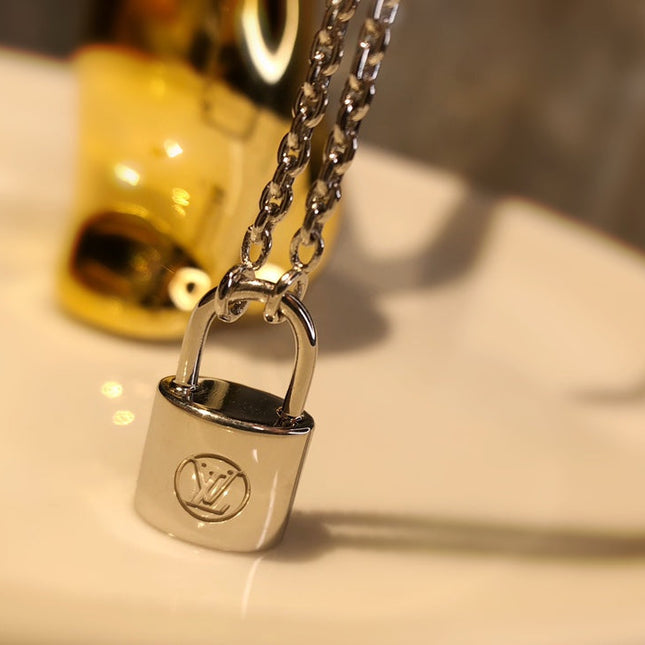 LV CHARITY LOCK NECKLACE