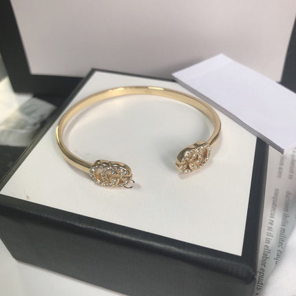 GOLD RUNNING DIAMOND LOGO BANGLE BRACELETS