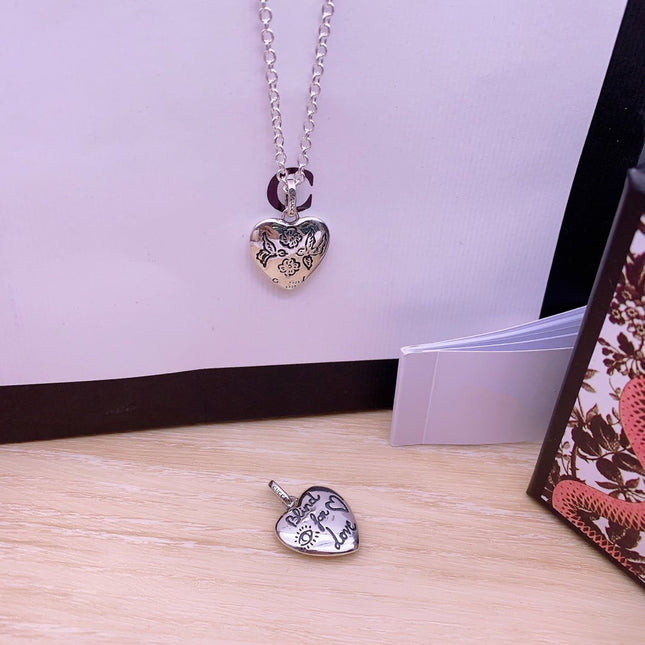 GG BLIND FOR LOVE STERLING SILVER HEART PENDANT NECKLACE