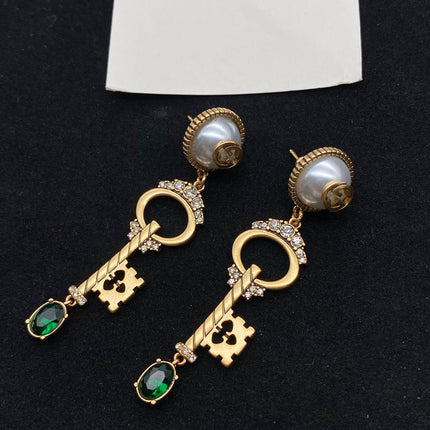 KEY SHAPED DANGLE GG EARRING