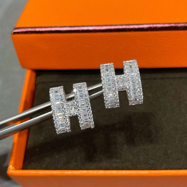 H STUD EARRINGS WITH SILVER DIAMONDS