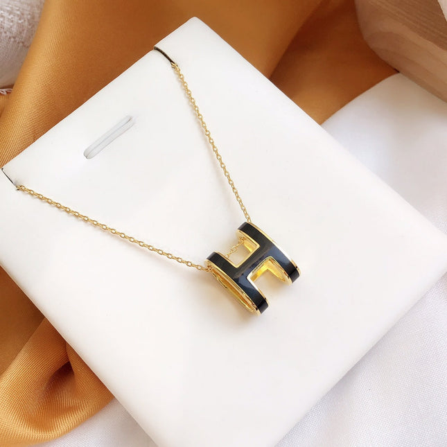 HM CLIC BLACK ENAMEL GOLD NECKLACE